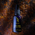 night cream,, miron violet glass, cosmetic, natural. black, glass, bottle, gift, gold, rusty wall.